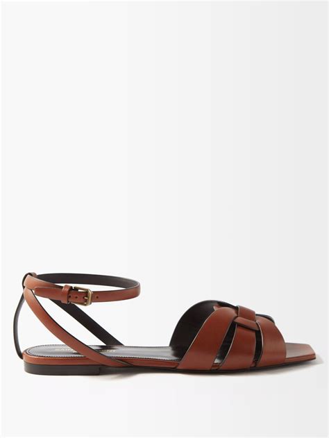 saint laurent tribute flat sandals.